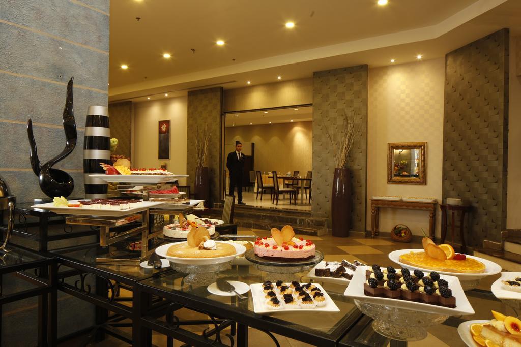 Golden Tulip Hail Bagian luar foto