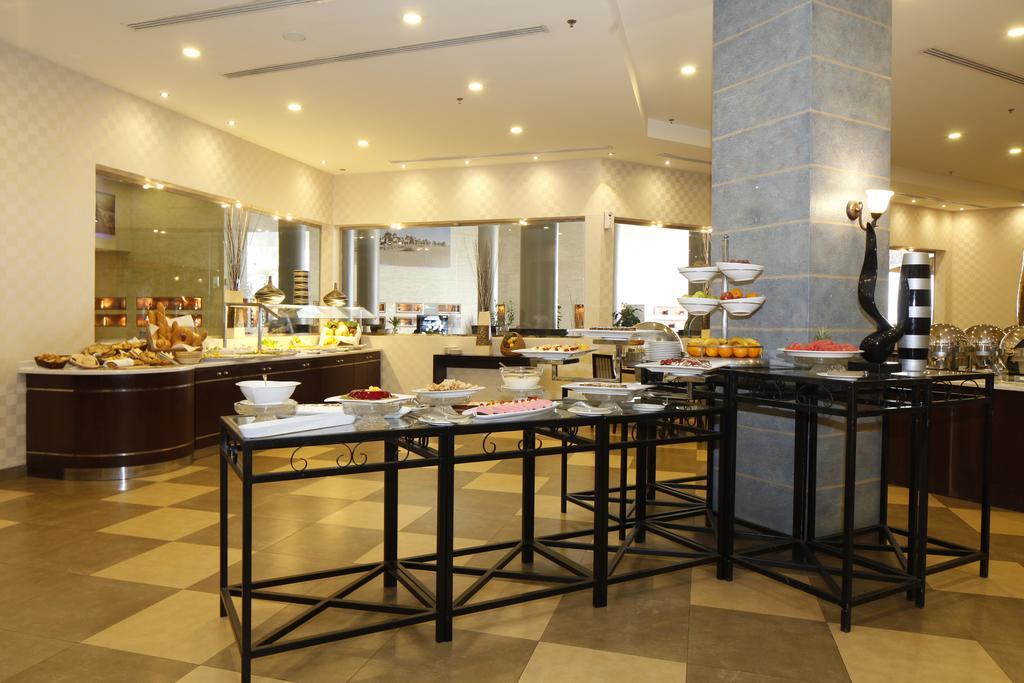 Golden Tulip Hail Bagian luar foto