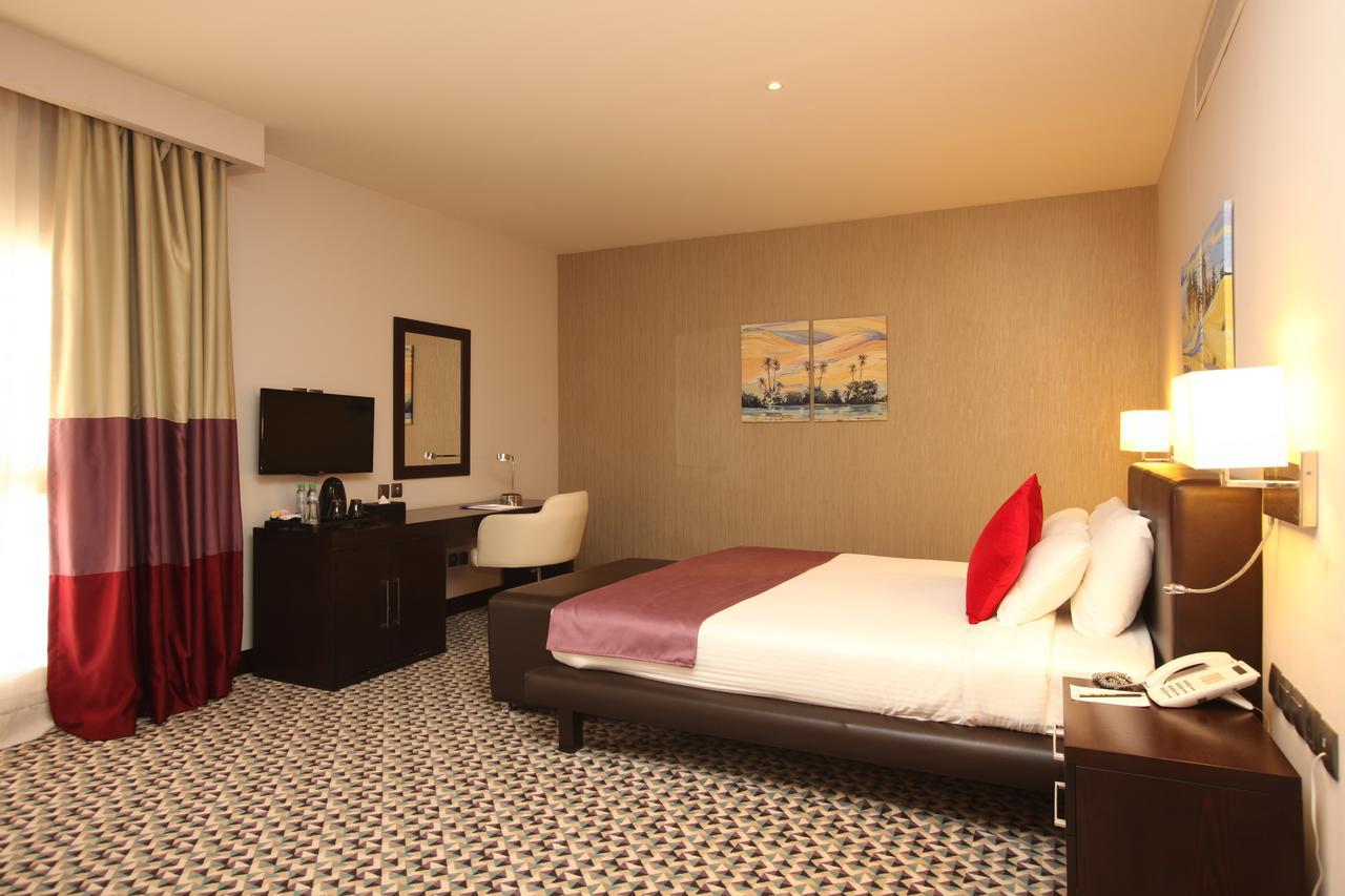 Golden Tulip Hail Bagian luar foto