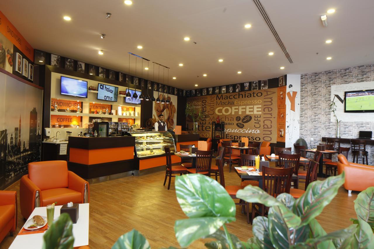 Golden Tulip Hail Bagian luar foto